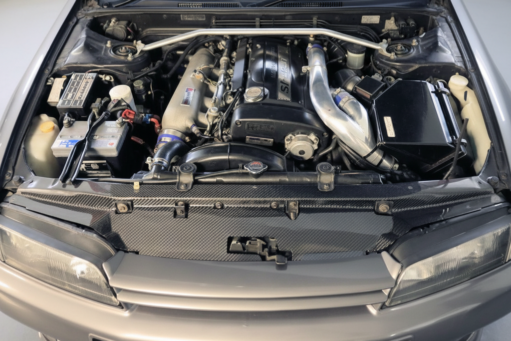 Car engine compartment with visible components